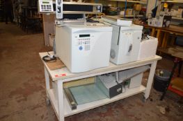 *Trolley and Contents Including Finnegan Mat GCQ Machine, etc.