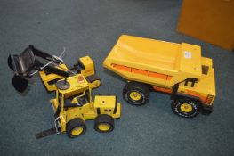 Three Tonka Trucks