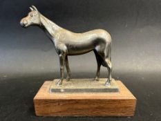 A car accessory mascot in the form of horse, display base mounted, approx. 4 3/4