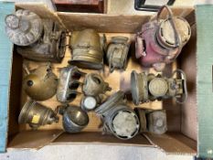 A good box of assorted early brass lamps, acetylene and electric including a Morris triple indicator
