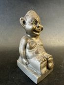 A car mascot in the form of a seated biliken, approx. 3