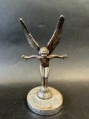 A car mascot in the form of a winged nude female, display base mounted, approx. 6 1/2