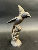 A car accessory mascot in the form of a bird perched on a branch, approx. 7