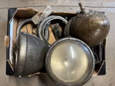 A box of various lamp parts.