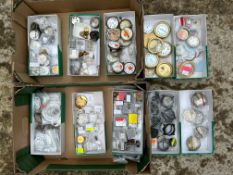 Two trays of car clock parts from a clock restorer.