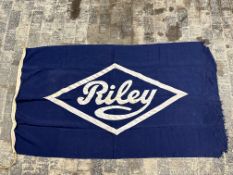 A large circa 1930s Riley showroom display flag, 71 x 41 1/2