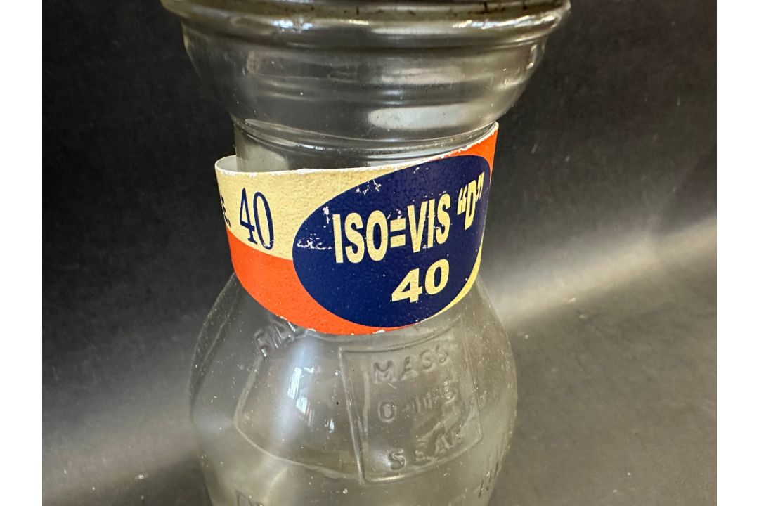 An American glass quart oil bottle with grade band on the neck and tin spout. - Image 2 of 2