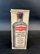 A bottle of The Many-Use Oil in original packaging.