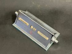 An AC plugs branded desktop chrome plated perpetual calendar.