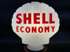 A Shell Economy glass petrol pump globe by Hailware, in superb condition, dated October 1966.