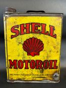 A Shell Motor Oil gallon can.
