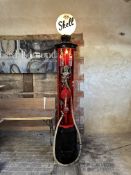 A 1925 Shell Mk. 3C octagonal based petrol pump, well restored in Shell livery, with hose and