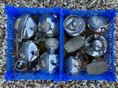 Two trays of spot/fog lamps.