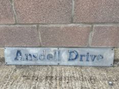 A metal road sign for Ansdell Drive, 42 x 7