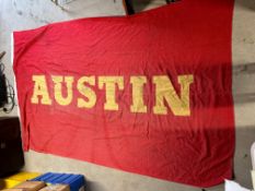 A large double sided canvas flag with appliqued lettering for Austin, 108 x 67 1/2