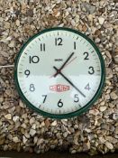 A working Smiths wall clock with a paper Jaguar logo applied, 13.5