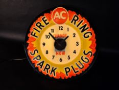 An unusual A.C. Fire Ring Spark Plugs light-up advertising wall clock, 16 1/2