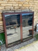 A large wall mounted display case with brass handles, 54 3/4