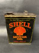A black Shell Motor Oil gallon can in excellent condition, stamped 'double' to one side.