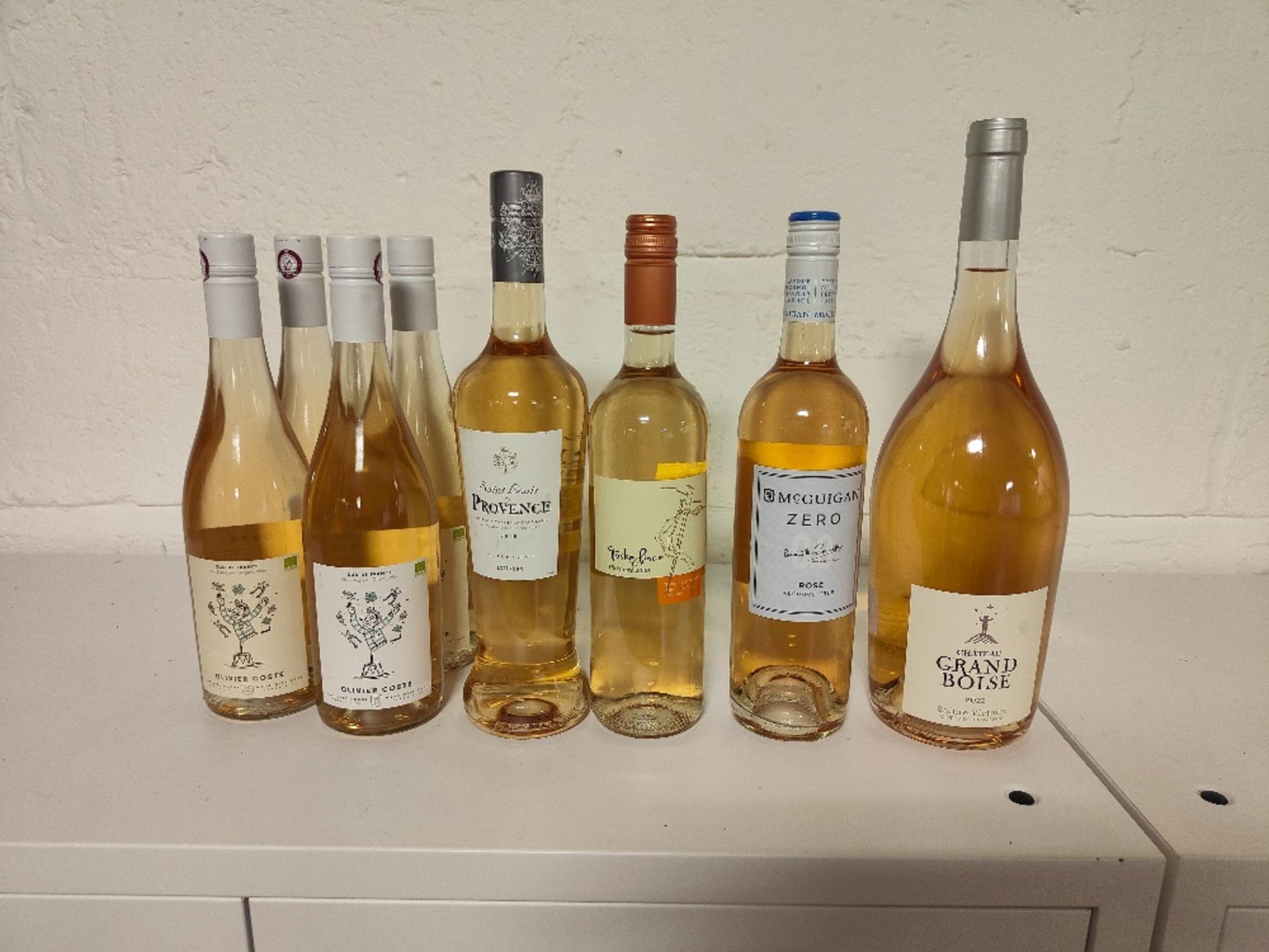 (8) Bottles of various Rose wines