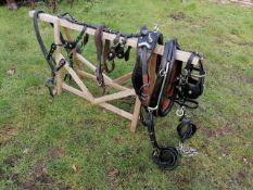 Complete set of black/red leather and white metal horseshoe buckle harness with 24