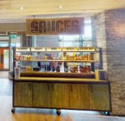 1 x Mobile Condiment Unit Featuring an Industrial Style Frame With Cage Mesh Panels, Distressed