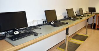 7 x Assorted LCD Monitors With Seven Keyboard and Mice Sets