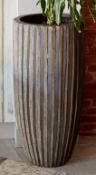 1 x Tall Freestanding Planter With an Abstract Sun Shaped Design