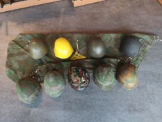 Konvolut von 9 CH-Ordonnanz Stahlhelmen M18