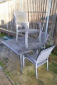 Four seater aluminium garden dining set to include table and four chairs, table height 72cm, table