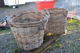 Two large wicker log baskets, height 85cm, width 105cm