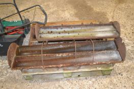 Three cast iron feeding troughs, the widest being 125cm
