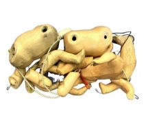 A small collection of small doll bodies, limbs etc.