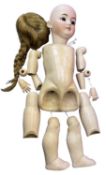 Simon & Halbig bisque head doll for restringing. Brown hair and eyes. Marked to back of head S&H
