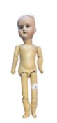 A German bisque head doll, complete but lacking hair. Marked to back of neck Made in Germany 1910
