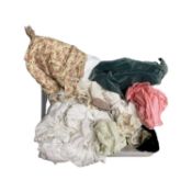 A large quantity of vintage dolls clothing.