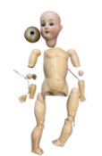 A Schoenau and Hoffmeister PB bisque head doll, for restringing and lacking hair. Marked 914 9