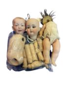 An assortment of various doll parts for restringing, including 2 bisque heads: - S&H/K&R -