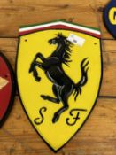 A Ferrari advertising cast sign, height approx 29cm