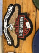 A Harley Davison advertising sign, cast, width approx 32cm