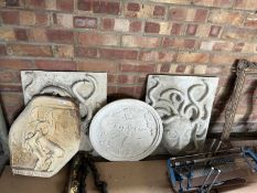 Four decorative wall plaques