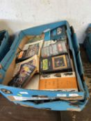 Two boxes containing approx 40 small format literature books