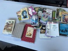 Mixed lot of cooking interest books together with a mixed quantity of novels