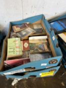 Two boxes containing approx 40 small format literature books