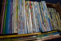 Box containing a large quantity of various Rupert annuals