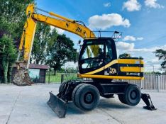 Jcb Js130w 4wd Wheeled Excavator C/W Blade & 2 X Support Legs