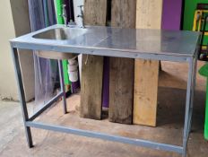 Stainless steel sink with taps