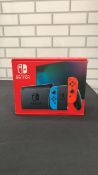 NINTENDO SWITCH CONSOLE RED/BLUE
