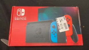 NINTENDO SWITCH NEON + MARIO KART 8 BUND