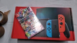 NINTENDO SWITCH NEON + MARIO KART 8 BUND